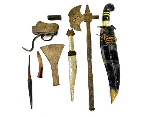 Various weaponry and effects, etc., a Khukri with shaped blade, axe, 47cm wide, a silvered dagger with scabbard, a pin fire s