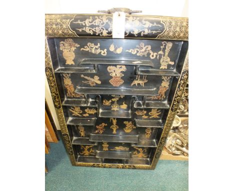 A Chinese gilt lacquer scholar's shelf display unit