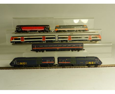 Four unboxed N Gauge Locomotives, a three car MDU in the livery of GNER, a two car DMU in the livery of South West both by Gr