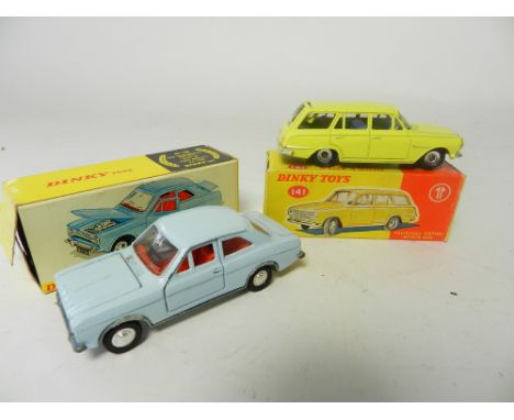 A boxed Dinky toys 141 Vauxhall Victor Estate and a boxed Dinky toys 168 Ford Escort (one box end flap missing) (2)