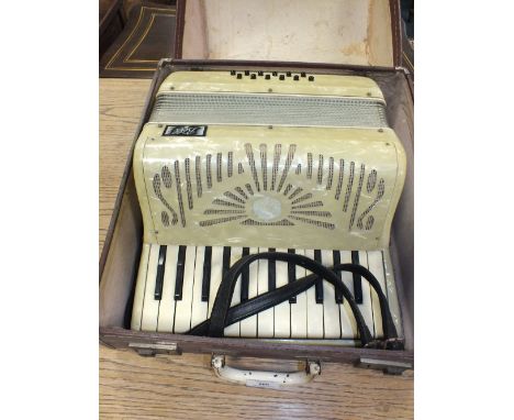  A Bell accordion with pearlised case, 25 keys and 12 buttons, with carry case.  