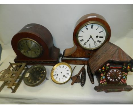A collection of early 20th century clock movements and parts together with three similar period mantle clock cases with part 