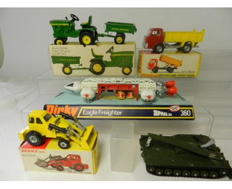 Five models by Dinky and Ertl, a part boxed Dinky 360 Eagle freighter with four pods and no paint loss, 438 Ford Tipper in or