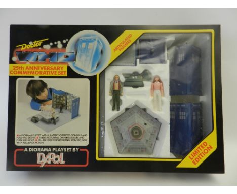 A Dr Who 25th anniversary set by Dapol (1987) complete and with Tardis with flashing light and centre console in unused condi