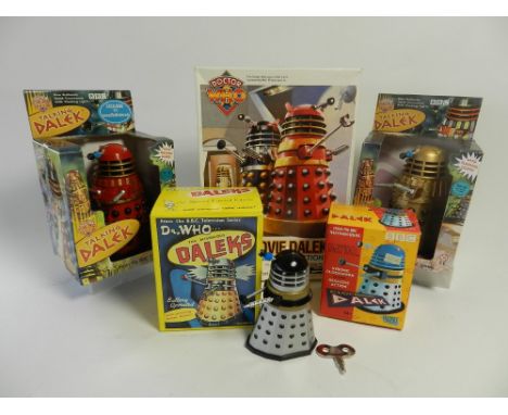 5 boxed, unused Dalek figures, two 6" versions in red and gold by Scificollector, a clockwork version by Products Enterprises