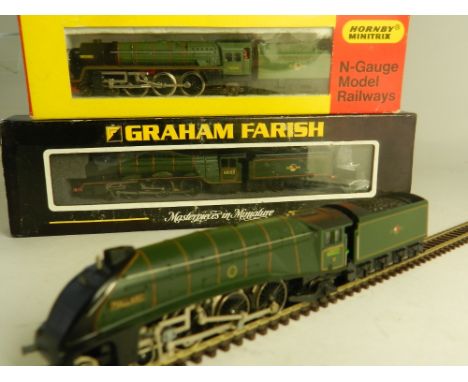 Three boxed N Gauge locomotives a Hornby N203 Brittania, a part boxed Minitrix N211 Mallard, and Graham Farish 372-378 Flying