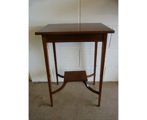 An Edwardian inlaid side table