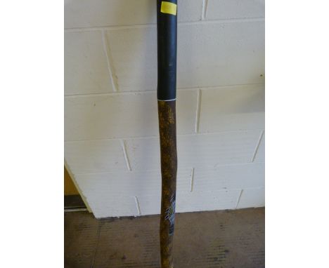A Didgeridoo with tribal decoration