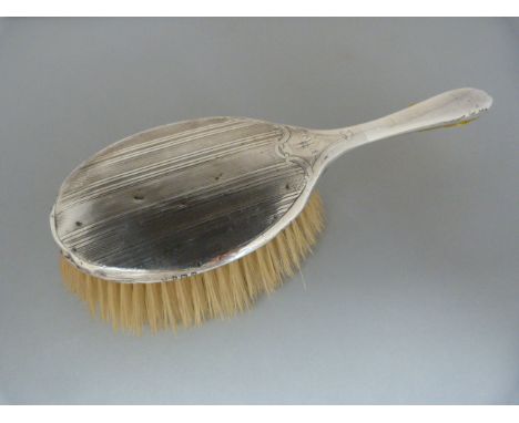 A Birmingham 1911 Hallmarked silver dressing table brush 