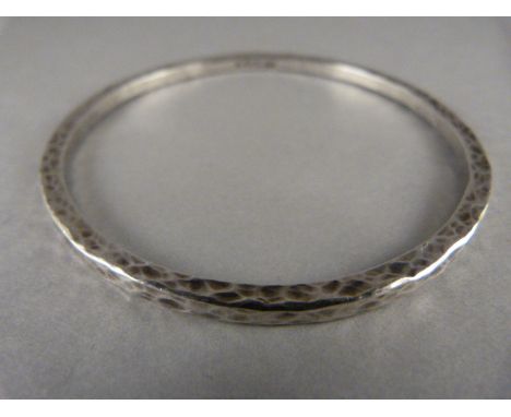 A hallmarked silver bangle - assayed Birmingham, makers mark Ivor Gordon Ltd 21.6g