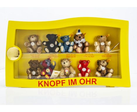 A rare Steiff display cabinet of ten small replica World Record teddy bears,  including Teddy Girl, Alfonzo and Elliot, all y