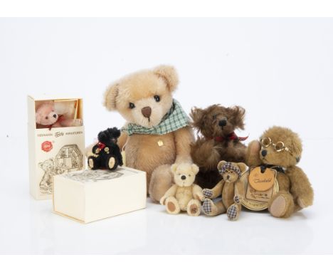 Seven collector's teddy bears,  two Hermann teddy Miniatures, in original boxes; a Grisly jointed bear  --9½in. (24cm.) high;