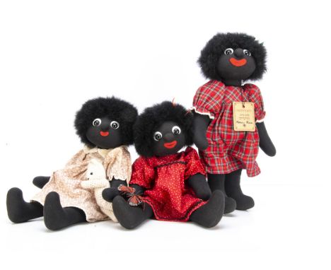 Three Robin Reeve Golly girls, Missy, Scarlet and Girly Golly, all with card tags --16½in. (42cm.) high. These items are list