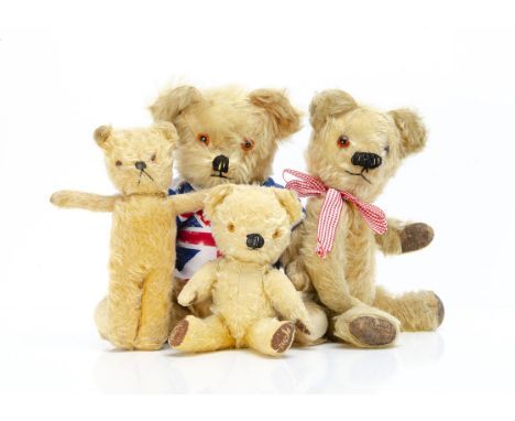 Four British post-war teddy bears,  a small Chad Valley with light golden mohair, orange and black plastic eyes, black stitch