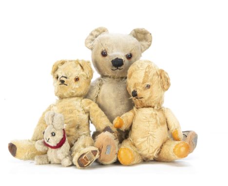 Two post-war Chad Valley teddy bears,  with glass eyes, black stitched noses and mouths, swivel heads and jointed limbs, the 