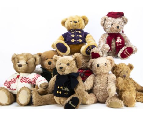 Sixteen recent teddy bears, including a Special Collector's Edition bear on tricycle and seven Harrods bears