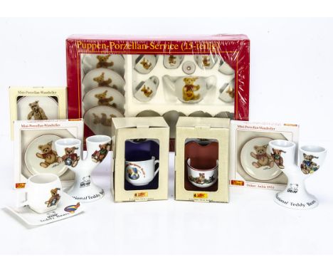 Steiff porcelain items,  a fifteen piece teddy bear's tea set; three miniature plates and two cups and saucers, in original b