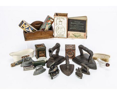 Doll's accessories,  a K &amp; Co London 'For my Dolly' baby bottle, in original box --3½in. (9cm.) high; five cast-iron smal