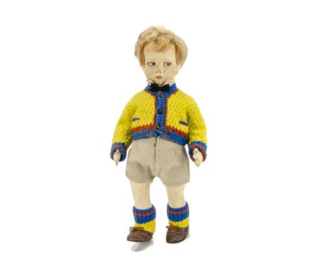 A Lenci 300 Series pressed felt sad boy doll,  with brown painted side glancing eyes, blonde mohair with  side parting, swive
