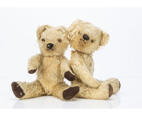Two post-war Chad Valley teddy bears,  one with blonde mohair, yellow and black glass eyes, pronounced clipped muzzle, black 