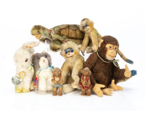 Post-war Steiff animals,  a Jocko monkey with brown mohair --9½in. (24cm.) high, a mohair turtle, two Mungo monkeys, dralon C