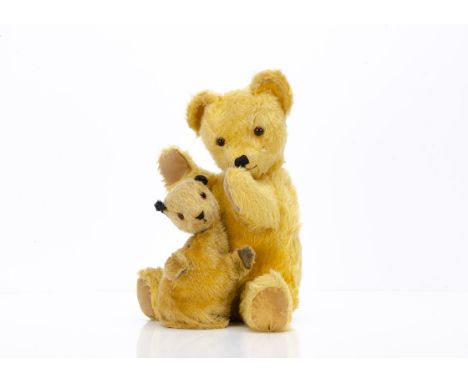 A post-war Alpha Farnell teddy bear nightdress case,  with golden mohair mix plush, orange and black glass eyes, black stitch