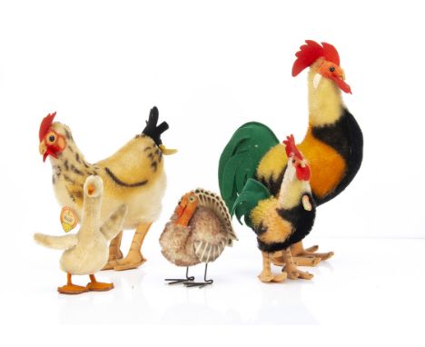 Post-war Steiff poultry, a Tucky turkey, a hen --8in. (20.5cm.) high and two cocks; and a goose, two with chest tags and four