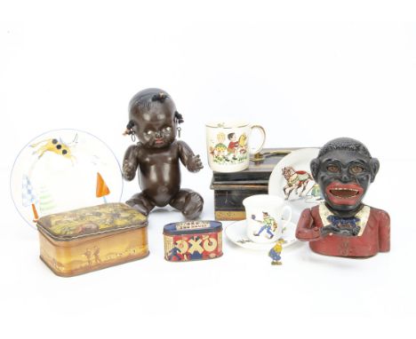 An Oxo Zoo House tin, for six Oxo cubes --3½in. (9cm.) long; a cast-iron Jolly bank; a Green Barley Sugar tin of hunting dogs