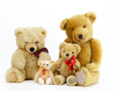 Four manufactured teddy bears,  two yellow tagged Steiff teddy bears, one Teddy Holland 1995 --6½in. (16.5cm.) high and a sof