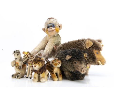 Post-war Steiff wild animals, a velvet zebra foal with script button, yellow cloth tag and chest tag -5in. (12.5cm.) long, a 