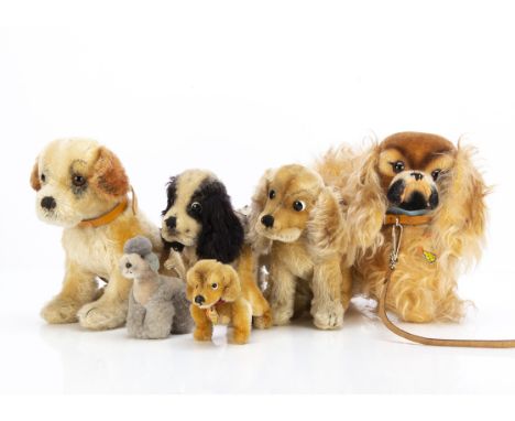 Post-war Steiff dogs,  a Peky Pekingese with chest tag, button and yellow cloth tag --9½in. (24cm.)  long, a Bernie seated St