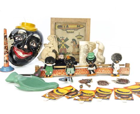 Various toys, a papier-mâché black faced clown mask --9¼in. (23.5cm.) high (paint flaking); a black boy shooting game (slight