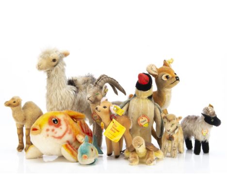 Various post-war Steiff animals,  a Peggy  penguin --8¼in. (21cm.) high, a Lama llama, a Snucki mountain sheep, a camel, two 