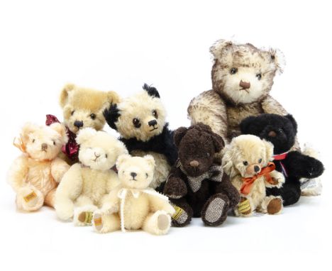 Eight Merrythought limited edition teddy bears,  including a brown tipped example --14½in. (37cm.) high (no tag certificates,