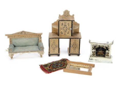 A small scale soft-metal and tinplate dolls' house fireplace, painted white with flames and smoke --2¾in. (7cm.) wide;  three