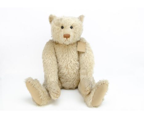 A large Brambles artist teddy bear Uncle Henry,  with white mohair, collar with bells and card tag --33in. (84cm.) high (a li