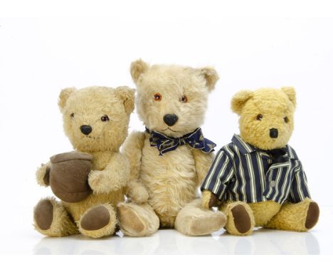 Three Chiltern teddy bears, a Hugmee with blonde mohair/mix plush, orange and black plastic eyes, black plastic nose, swivel 