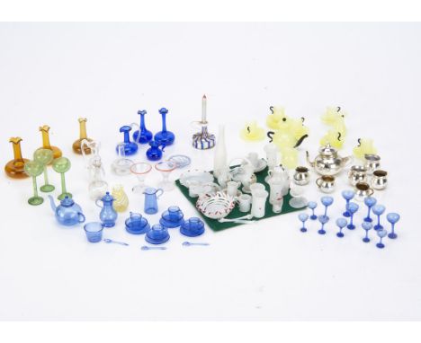 A quantity of dolls' house glass,  including milk glass baskets, three jugs, cups and saucers, a bottle, a silvered and blue 