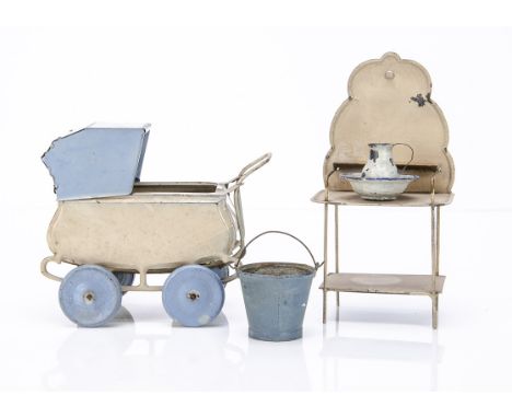 A painted tinplate doll's perambulator,  beige with cream hood and wheels --5¾in. (14.5cm.) long; a painted washstand with ti