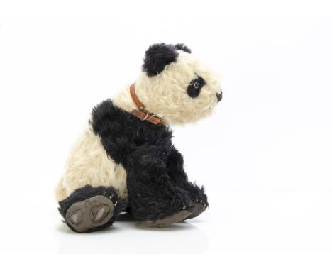 A rare Dean's Rag Book Co Ming walking Panda circa 1949,  with black and white mohair, clear and black glass eyes, black stit