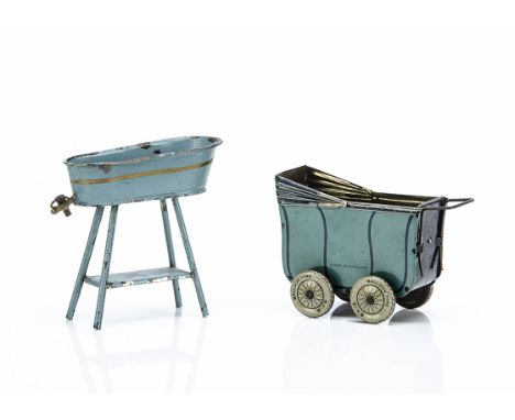 A German painted tinplate dolls' house bath, painted blue, on stand with tap --4¾in. (12cm.) high; and Wells Brimtoy lithogra