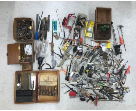 Large quantity of various tools to include incomplete staking set, wristwatch case opening tools, pliers, magnifiers, screwdr