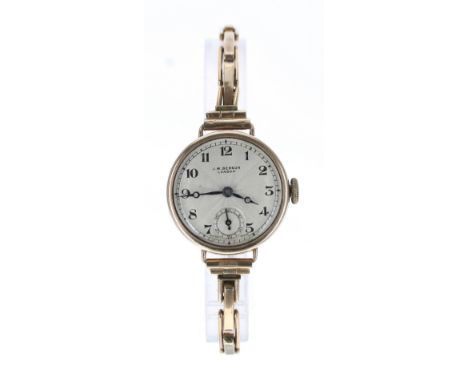 J.W. Benson 9ct lady's wristwatch, Birmingham 1934, signed silvered dial with Arabic numerals, minute track and subsidiary se