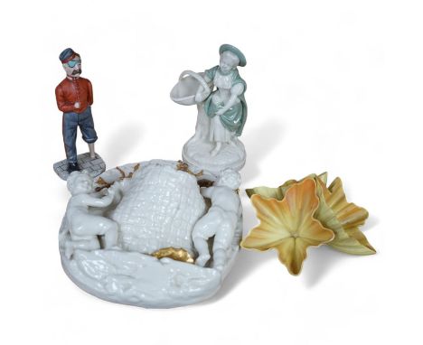 A Royal Worcester gilt figural wall pocket, two figures and a petal ornament, largest 22cm high. Condition - fair to goodWall