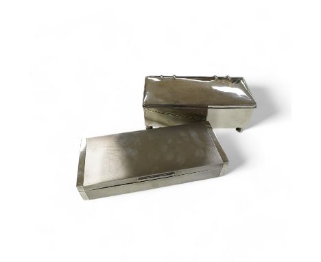 A George V engine turned silver cigarette box, by Padgett &amp; Braham Ltd, London, 1935, 21.6cm and an earlier Irish silver 