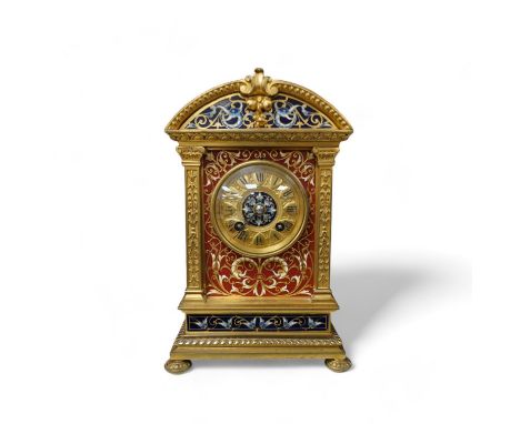 A late 19th century French champlevé enamel mantel clock, 22cm. Condition - good but with wear to dial, not tested as working