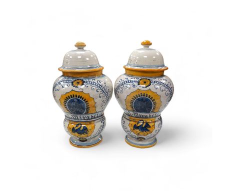 A pair of 17th century style maiolica drug jars and covers, 34cm. Condition - good