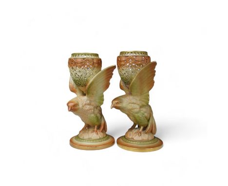 A pair of Royal Worcester blush ivory pot pourri, lacking covers, model number G11, height 9cm. Condition - good