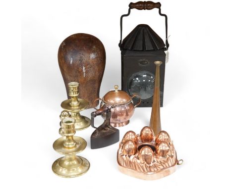 A Toleware lantern, a hatter's block, a copper jelly mould, a slug iron and three other items, tallest 34cm (7). Condition - 