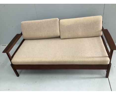 A mid century Robin Day style teak sofa bed, width 149cm, depth 72cm, height 68cm. Condition - poor